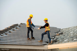 Construction engineer wear safety uniform install the new roof,R